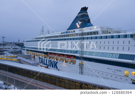 A cruise ship docked in the port of Tallinn in the early morning, Estonia / Tallinn, Estonia A cruise ship docked in the port of Tallinn in the early morning, Estonia / Tallinn, Estonia 128880364