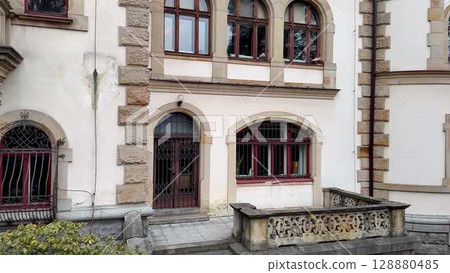 Discover the Elegant Architectural Detail Found on the Exterior of a Historic Building Discover the Elegant Architectural Detail Found on the Exterior of a Historic Building 128880485