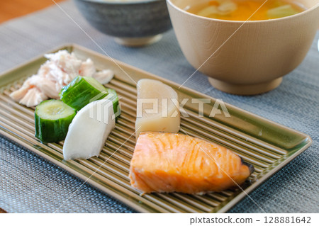 A healthy Japanese-style breakfast set featuring grilled salmon, natto, and more A healthy Japanese-style breakfast set featuring grilled salmon, natto, and more 128881642