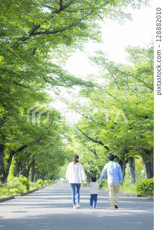Family walking in the fresh green park Family walking in the fresh green park 128882010