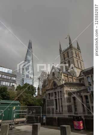 Southwark Cathedral (historic Gothic church) and The Shard (London's tallest skyscraper) with sky in the background. Southwark Cathedral (historic Gothic church) and The Shard (London's tallest skyscraper) with sky in the background. 128882037