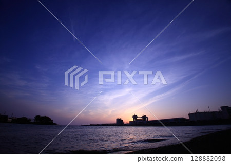 Sunset over the sea 128882098