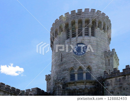 Public clock on old stone tower Public clock on old stone tower 128882433