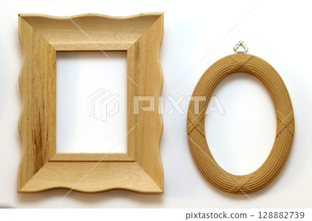 Retro wooden frames on wall Retro wooden frames on wall 128882739