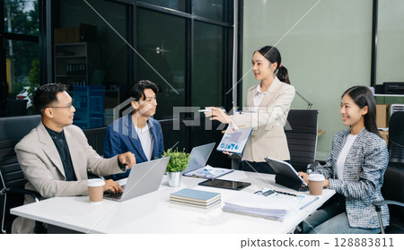 Young business creative team are brainstorming planning discussing while sitting in creative business discussing work 128883811