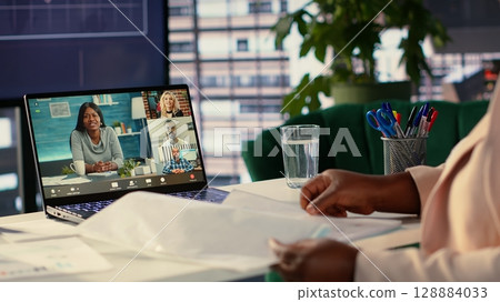 Leader discussing with shareholders about increasing profit strategy, meeting on online videocall for networking and strategic thinking. Entrepreneur asking associates for advice. Camera A. 128884033