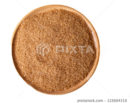 Organic Light Brown Sugar on wooden board. Organic Light Brown Sugar on wooden board. 128884318