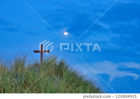 Wooden Cross On Beach Morning Storm Cloud Sky Wooden Cross On Beach Morning Storm Cloud Sky 128884915