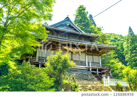 [World Heritage Iwami Ginzan Silver Mine Ruins and its Cultural Landscape] The worship hall of Sahimeyama Shrine in early summer, Oda City, Shimane Prefecture 128886956