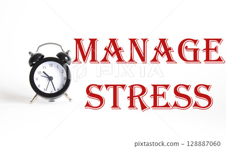 Manage stress symbol. Concept word Manage stress on Beautiful white background with alarm clock. Medicine and Manage stress concept. Copy space Manage stress symbol. Concept word Manage stress on Beautiful white background with alarm clock. Medicine and Manage stress concept. Copy space 128887060