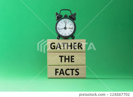 Gather the facts symbol. Wooden blocks with words Gather the facts. Beautiful green background with alarm clock. Business and Gather the facts concept. Copy space. Gather the facts symbol. Wooden blocks with words Gather the facts. Beautiful green background with alarm clock. Business and Gather the facts concept. Copy space. 128887702