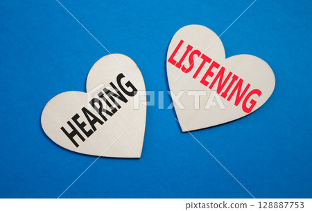 Growth and Stability symbol. Concept word Growth and Stability on wooden hearts. Beautiful blue background. Business and Growth and Stability concept. Copy space 128887753