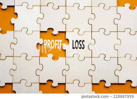 Profit or Loss symbol. Concept word Profit or Loss on wooden puzzle. Beautiful orange background. Business and Profit or Loss concept. Copy space 128887959