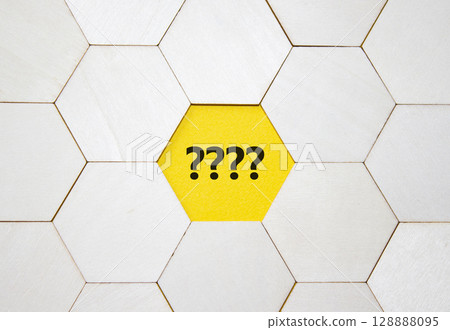 Question marks symbol. Concept words question mark on wooden comb puzzle. Beautiful yellow background with succulent plant. Business and question mark. Copy space. 128888095