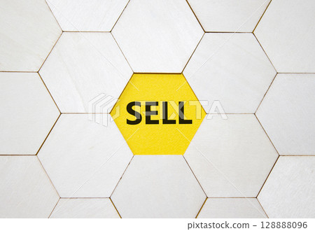 Sell symbol. Concept word Sell on wooden comb puzzle. Beautiful yellow background. Business and Sell concept. Copy space. Sell symbol. Concept word Sell on wooden comb puzzle. Beautiful yellow background. Business and Sell concept. Copy space. 128888096