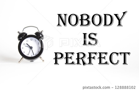 Nobody is Perfect symbol. Concept word Nobody is Perfect on Beautiful white background with alarm clock. Business and Nobody is Perfect concept. Copy space 128888102