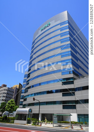 A high-rise building shining against the blue sky July Chuo 757 Kao Head Office 128889267