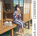 A woman in a yukata drinking beer on a Japanese-style veranda 128889880