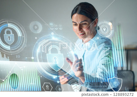 Professional Woman Interacting With Secure Digital Interface Featuring Lock Symbol 128893272