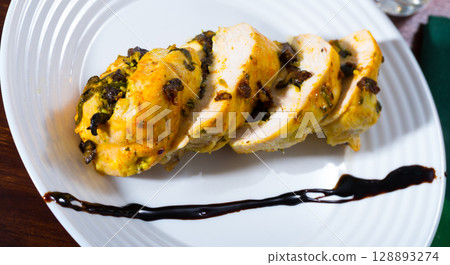 Roasted stuffed turkey breast Roasted stuffed turkey breast 128893274
