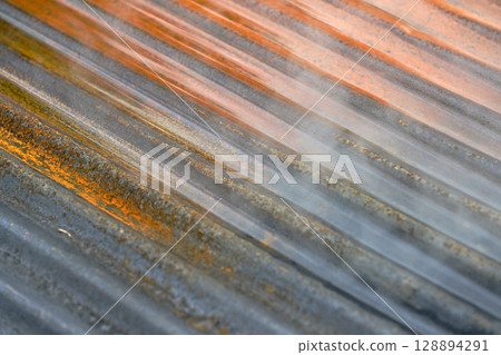 Rusty corrugated galvanized sheet Rusty corrugated galvanized sheet 128894291