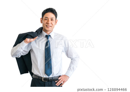 Middle-aged Asian businessman in a suit with his jacket draped over his shoulders 128894466