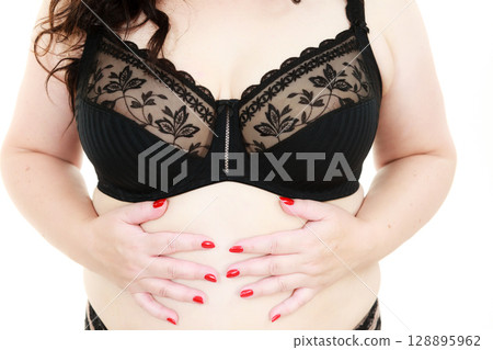 Plus size woman wearing bra lingerie Plus size woman wearing bra lingerie 128895962