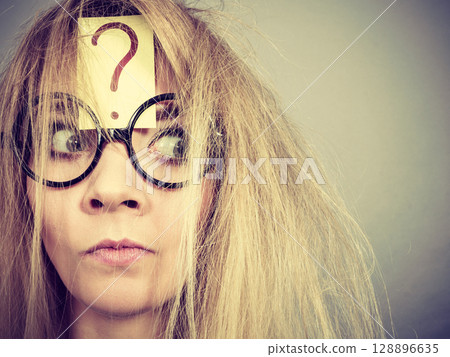 Tired crazy woman after intensive thinking 128896635