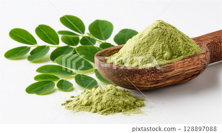 Natural image of moringa leaves and powder on a wooden spoon 128897088