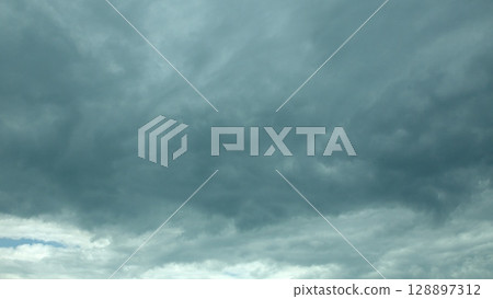 The skies are overcast today, adorned with dramatic cloud patterns that captivate the eye 128897312