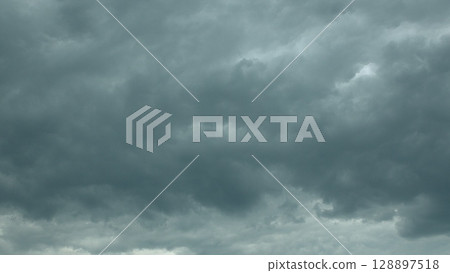 A Dramatic Overcast Sky with Dark, Brooding Clouds Enhancing the Atmospheric Feel of Nature 128897518