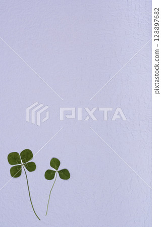 Colorful Japanese paper and four-leaf clover background material Colorful Japanese paper and four-leaf clover background material 128897682