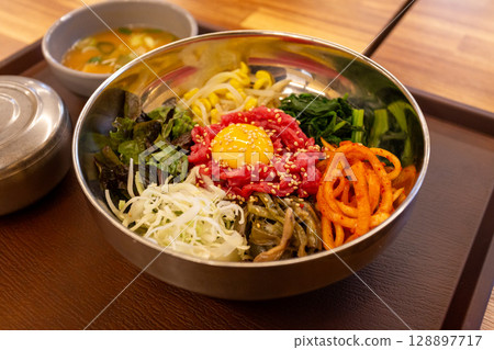 Korean traditional food. Beef Tartare Bibimbap Korean traditional food. Beef Tartare Bibimbap 128897717