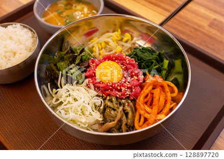 Korean traditional food. Beef Tartare Bibimbap Korean traditional food. Beef Tartare Bibimbap 128897720