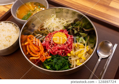 Korean traditional food. Beef Tartare Bibimbap Korean traditional food. Beef Tartare Bibimbap 128897724