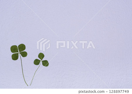 Colorful Japanese paper and four-leaf clover background material 128897749