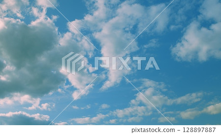 The Beautiful Cloudy Sky is Majestically Overhead, Creating a Stunning Visual Experience 128897887