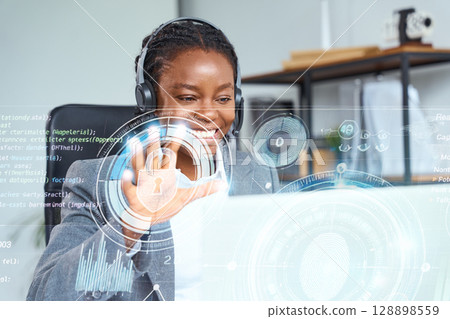 Businesswoman Using Modern Virtual Screen Display for Technology and Cybersecurity Solutions 128898559