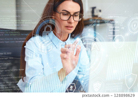 Professional Woman Utilizing Virtual Technology For Cybersecurity And Data Protection In Office 128898629