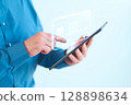 Using A Digital Tablet For Secure Online Payment With Virtual Credit Card Interface 128898634