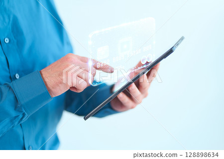 Using A Digital Tablet For Secure Online Payment With Virtual Credit Card Interface 128898634
