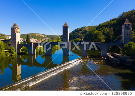 Drone view of bridge Pont Valentre crossing Lot River in Cahors 128898950