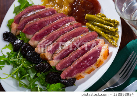 Duck breast Magret with prunes Duck breast Magret with prunes 128898984
