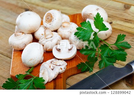 Fresh champignons and greens 128899042