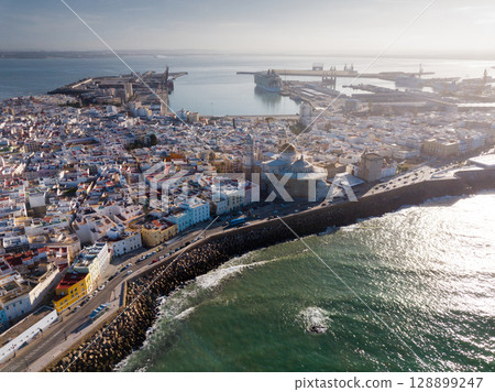 Aerial view of old town Cadiz with port and buildings at seashore 128899247