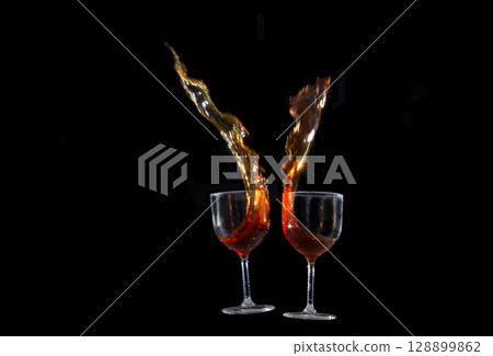 Coffee glasses colliding 128899862