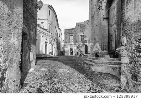 Ancient street in old town of a southern Italy village Ancient street in old town of a southern Italy village 128899917