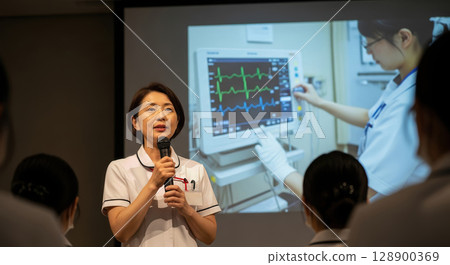 Veteran Asian nurse giving a performance Veteran Asian nurse giving a performance 128900369