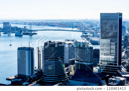 Tokyo Bay near Takeshiba Pier, Minato Ward, Tokyo, on a sunny day in 2021, with the Rainbow Bridge visible in the distance 128901413