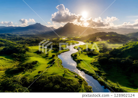 River winding through lush green valley in panama canal at sunset 128902124